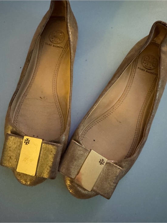 Tory Burch Shoes - Tory Burch Gold Metallic Bow Flats with Logo Plaque Size 6.5